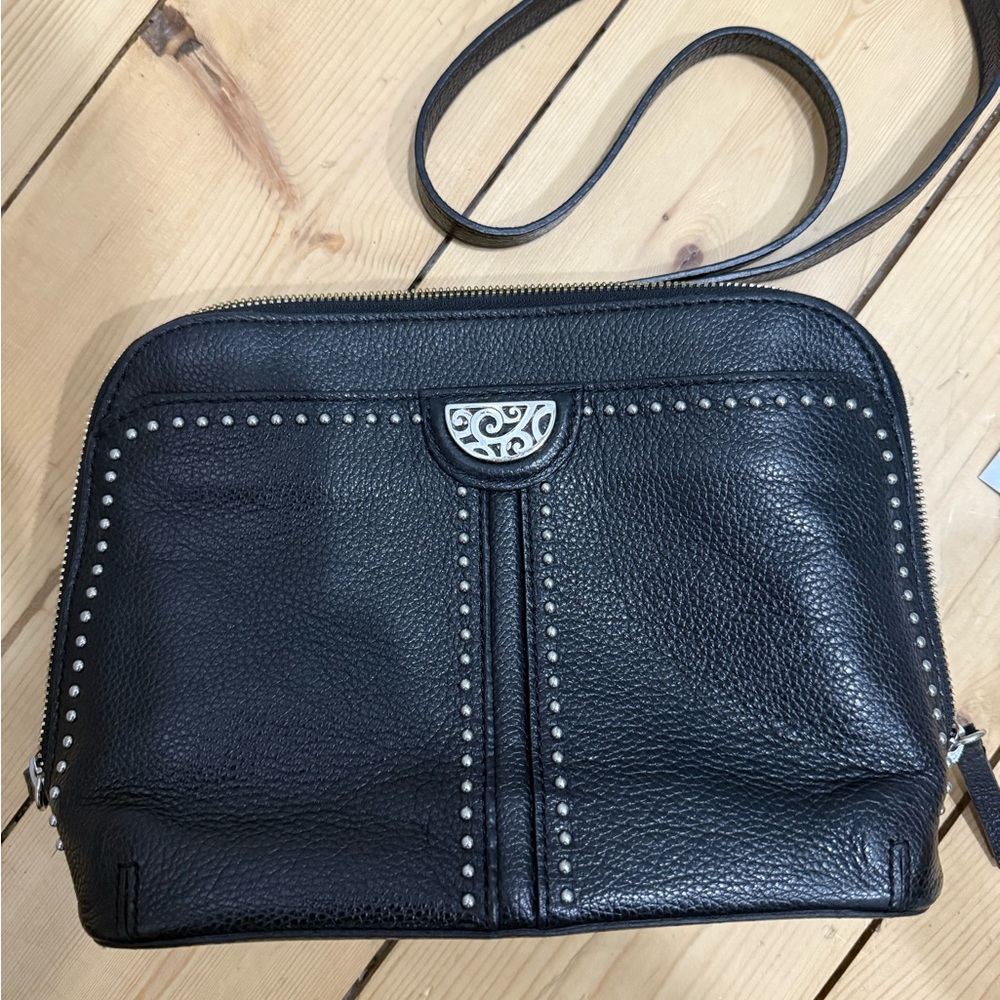 Brighton Jojo Domed Organizer crossbody in black leather with silver studs.